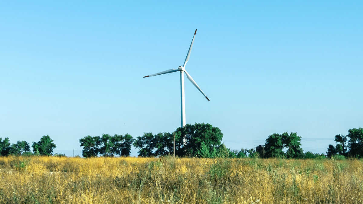 modern-wind-turbines-against-blue-sky.jpg
