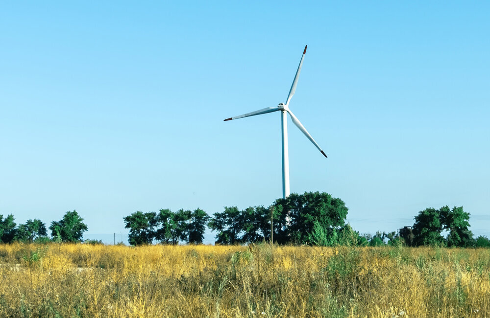 modern-wind-turbines-against-blue-sky.jpg